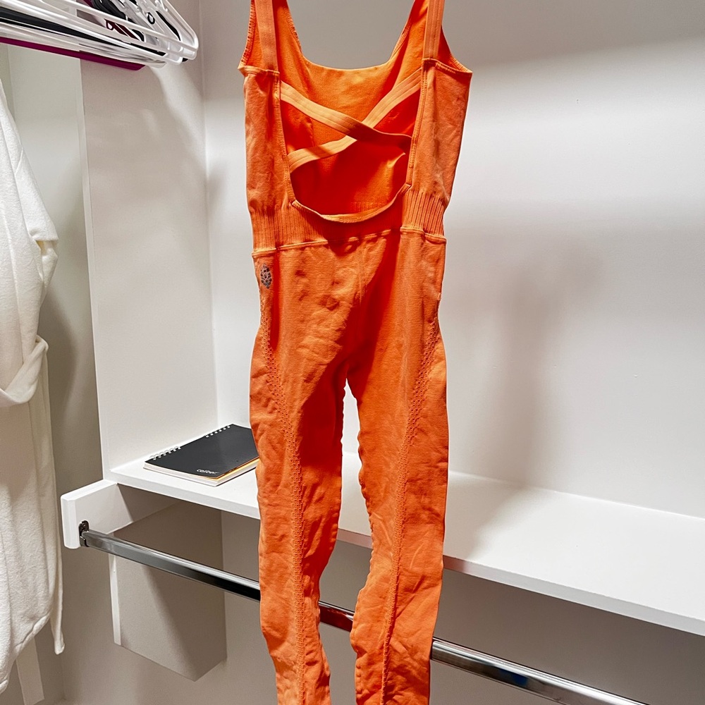 FP Movement “Good Karma” Orange onesie